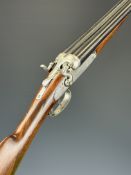 Belgian 16 bore side by side hammer action shotgun with border engraved locks, chequered grip,