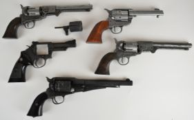 Five Denix and similar replica revolvers including Colt, Smith & Wesson and Remington style, largest