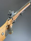 Anschutz Super-Match Model 1813 .22 bolt-action target rifle with textured thumb-hole grip,