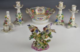 Four Dresden porcelain flower encrusted candlesticks, twin handled basket and an unmarked bird