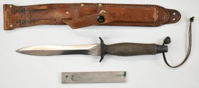 Gerber Portland Oregon fighting or similar knife with textured handle and named blade, numbered