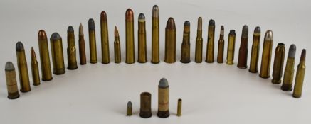 Thirty-one collector's mainly rifle cartridges including .577 Snider, .577-500, .475, Kynoch 12 bore