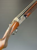 Webley Beretta 12 bore over and under ejector shotgun with named and engraved locks, engraved