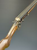 El Chimbo .410 side by side hammer action folding poacher's shotgun with chequered semi-pistol