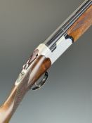Beretta S56E 12 bore over and under ejector shotgun with named and engraved locks and underside,