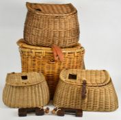 Four vintage wicker fishing creels including a small Victorian example, and two fishing locks,