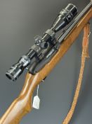 Ruger Model 10/22 .22 semi-automatic rifle with semi-pistol grip, leather sling, Tasco 4-16x40 scope