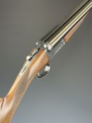 SKB 12 bore side by side ejector shotgun with engraved locks, underside, trigger guard, top plate,