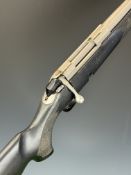 Tikka M595 .222 Remington bolt-action rifle with composite stock, chequered semi-pistol grip and