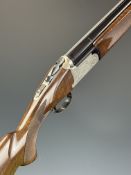 Franchi 12 bore over under ejector shotgun with named and engraved locks, underside and thumb lever,