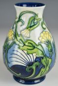 Moorcroft pedestal vase decorated in the Rough Hawksbeard pattern, signed to base and dated 97,