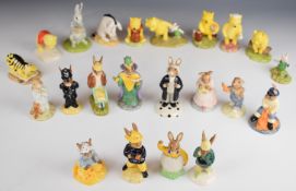 Twenty two Royal Doulton Bunnykins and Winnie the Pooh figures, boxed