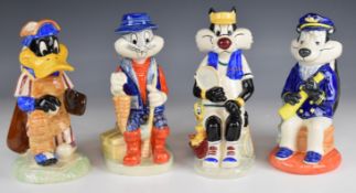 A set of four Kevin Francis Looney Tunes figures, all boxed, tallest 26cm