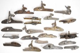 Twenty two mainly percussion gun locks and lock plates including a pair of Houllier Blanchard, a