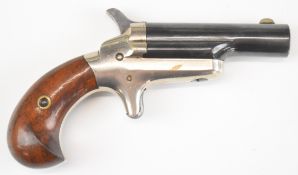 Colt Derringer .41 rimfire pocket pistol with sheath trigger, shaped wooden grips and named 2.5 inch