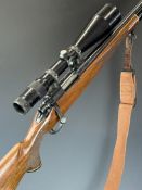 Remington 700 .223 bolt-action rifle with chequered semi-pistol grip and forend, raised cheek piece,