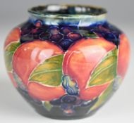 William Moorcroft squat vase decorated in the Pomegranate pattern, signed to base, H6.5cm
