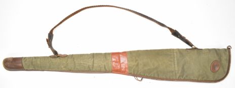 Holland & Holland canvas and leather shotgun or rifle slip with 'By Appointment to HRH The Duke of