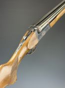 Zabala 10 bore side by side shotgun with engraved lock and underside, chequered semi-pistol grip and
