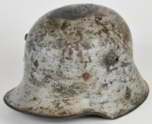 WW1 German M16 steel helmet in an Austrian Hechtgrau (pike grey) paint scheme, interior stamped with