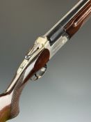 AYA Yeoman 12 bore over and under ejector shotgun with named locks and underside, chequered semi-