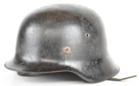 WW2 Nazi German / Third Reich M42 steel helmet, interior indistinctly stamped with ET66 and batch