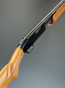 Mossberg .410 3-shot pump-action shotgun with chequered semi-pistol grip and forend, vented rib