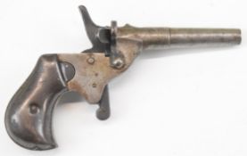 JGA .22 blank firing or starting pistol with named frame, shaped metal grips and 2.55 inch barrel,