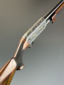 Ithaca Model 37 12 bore 3-shot pump-action shotgun with applied gold dogs and birds to the