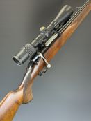 Husqvarna 9.3x62 bolt-action rifle with chequered semi-pistol grip and forend, adjustable sights,