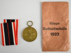 WW2 Nazi Germany / Third Reich War Merit Medal 1939 (Kriegsverdienstmedaille), together with ribbon,