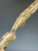 Laurona 12 bore over under ejector shotgun with Advantage camouflage finish, chequered semi-pistol