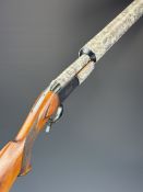 Baikal IJ-18 12 bore single barrelled shotgun with chequered semi-pistol grip and 34.5 inch sound