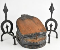 Pair of trench art fire dogs, horseshoes marked 1944 and 7F together with a foot operated bellow,