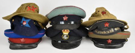 Russian / Soviet Union eight military hats including topical / Afghanistan issues, some with