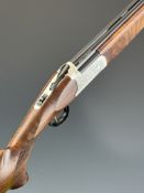 Kofs Sceptre SxE 20 bore over and under ejector shotgun with engraved locks and underside, chequered