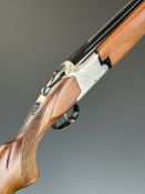 Laurona 12 bore over and under ejector shotgun with engraved locks, chequered semi-pistol grip and