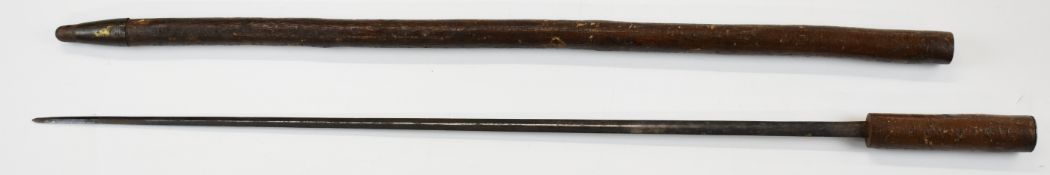 A 19thC wooden swordstick with rustic bark effect finish, 73cm elliptical blade and engraved