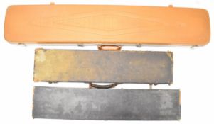 Three shotgun or rifle carry cases comprising one Gun Guard, W C Carswell Ltd canvas bound example