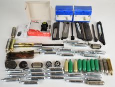 A collection of air rifle and pistol accessories including magazines, Theoben .22 air ram, CO2
