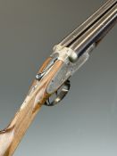 Henry Clarke 12 bore sidelock side by side ejector shotgun with scrolling engraving to the locks,