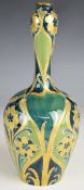 William Moorcroft Macintyre Florian Ware vase decorated in green and gold, with signed and printed