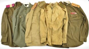 Five Russian / Soviet Union WW2 or later shirts / tunics with insignia