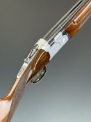 Beretta S687 12 bore over and under ejector shotgun with named and engraved locks and underside,