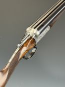 E J Churchill 12 bore side by side ejector shotgun with named and engraved locks, engraved