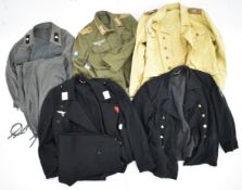 Five reproduction German and Soviet military uniforms