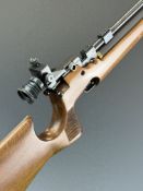 Air Arms S200 .22 PCP air rifle with textured semi-pistol grip and adjustable trigger and target