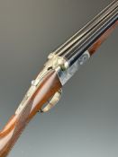G T Griffiths of Cardigan Spanish made 12 bore side by side ejector shotgun with chequered grip