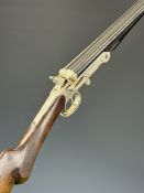 El Faisan .410 side by side hammer action folding poacher's shotgun with engraved birds to the locks