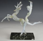 Art Deco Istvan Komaromy glass figure of a nude dancer with prancing deer, raised on marble base,